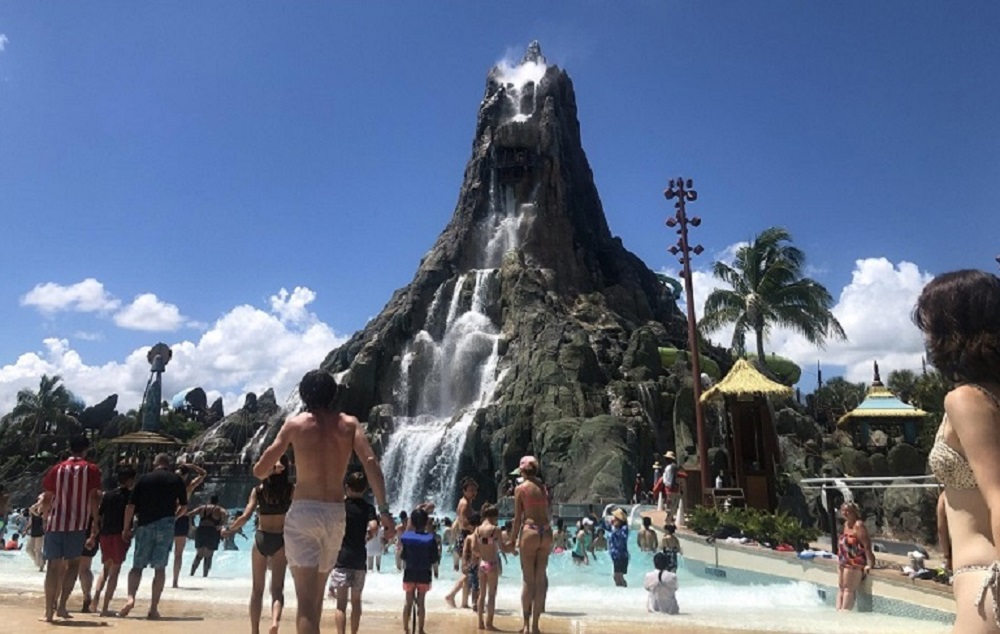 Visitors enjoying a thrilling roller coaster ride at a theme park in Orange County, Florida