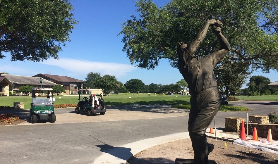 Golfer teeing off at Bay Hill golf course in Orlando
